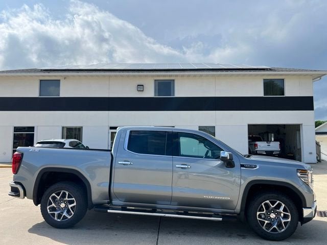 2026 GMC Sierra 1500 SLT in Sterling Metallic — front three-quarter view