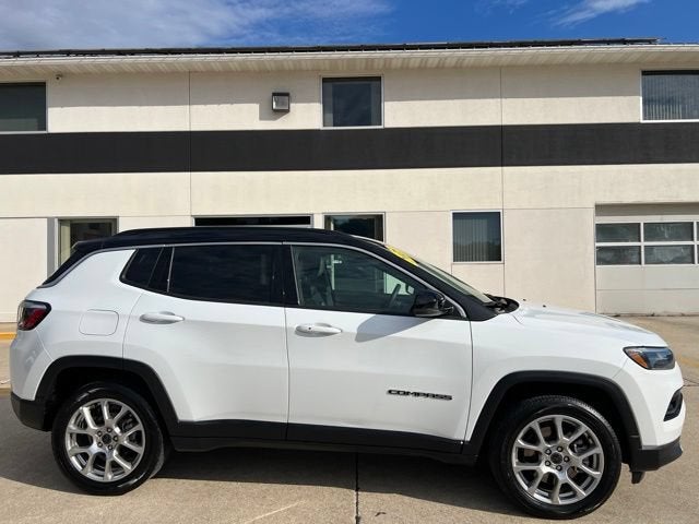 2025 Jeep Compass Limited in Bright Whi — front three-quarter view
