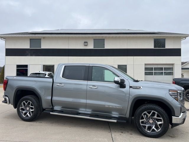 2026 GMC Sierra 1500 SLT in Sterling Metallic — front three-quarter view